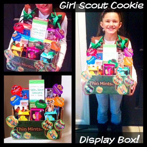 My "Girl Scout Cookie Display Box". I grabbed a t-shirt gift box the other day as we ran out of the house to go sell cookies, and it did work, but it was SO flimsy. So I promised my daughter I'd make her a better one the next day. This was the result. And she loves it! Cookie Gift Basket, Girl Scout Cookie Booth, Table Booth, Daisy Ideas, Girl Scout Mom, Cookie Booth, Girl Scout Cookie Sales, Girl Scout Cookies Booth, Gs Cookies