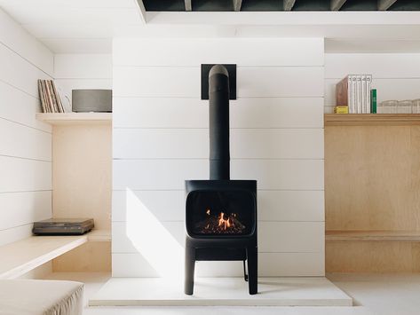 Trending on Remodelista: 5 Household Quandaries, Solved - Gardenista Shiplap Paneling, Modernist Cuisine, Loft Kitchen, Wood Bath, Cast Iron Stove, Emily Henderson, Built In Furniture, Pellet Stove, Stove Fireplace