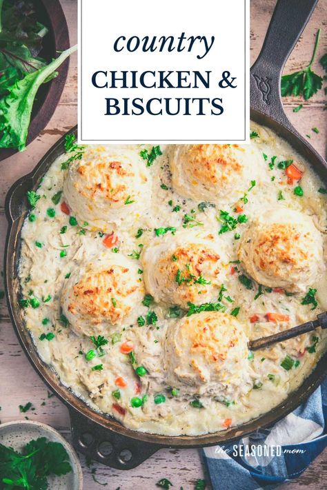 Country Chicken and Biscuits is a classic down-home comfort food dinner! The creamy chicken and vegetables are topped with fluffy, cheesy drop biscuits for a hearty and delicious family-friendly meal. Bake it in a casserole dish or in a cast iron skillet and supper is served! Country Chicken And Biscuits, Casserole Dinners, Chicken Casserole Dinners, Homemade Bisquick, Leftover Rotisserie, Country Chicken, Chicken And Biscuits, Chicken Entrees, Drop Biscuits