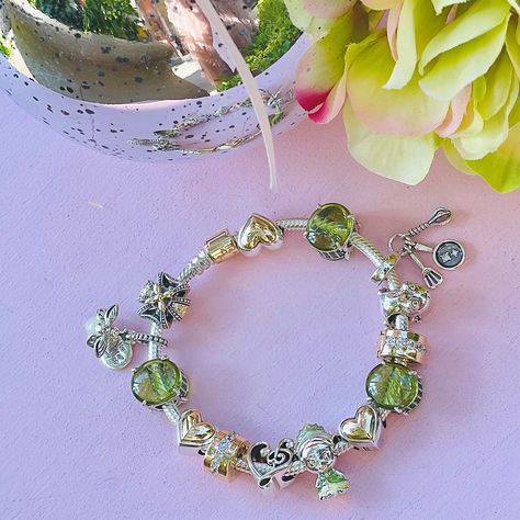 Today for #WorldPrincessWeek, it's all about Princess Tiana! The Princess and the Frog premiered in 2009 and TIana's signature color green is perfect for this month's birthstone. Tiana is ambitious, confident, driven and talented! 💚 Tell us below which word describes YOU the most! #PandoraLasVegas #PandoraJewelry #PandoraCharms #DisneyxPandora #PrincessTiana #ThePrincessandtheFrog #PandoraBracelets #AugustBirthstone #KissAFrog #DisneyPrincess Tiana Pandora Charm, Princess Tiana Inspired Jewelry, Tiana Pandora Bracelet, The Princess And The Frog Jewelry, Princess Tiana Pandora Charm, Princess And The Frog Charm Bracelet, Princess Tiana Necklace, Tiana Princess And The Frog Jewelry, Princess And The Frog Necklace