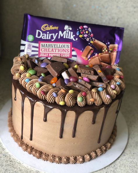 Ennah's Cakes on Instagram: “Cadbury’s marvellous creations cake, topped with lots of chocolate🍫🍫 - - - - #cake #cakesofinstagram #cakeinspo #cakeinspiration…” Cadbury Chocolate Cake, Marvellous Creations, Chocolate Video, Showstopper Cakes, 12th Birthday Cake, 30 Cake, Chocolate Cake Designs, Birthday Chocolate, 18th Birthday Cake