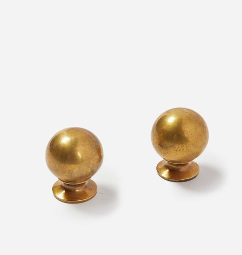 Description Crafted from solid brass with an unlacquered antique finish, the Carlow Brass Knob is an elevated accent for any home. Understated yet elegant, this weighty ball knob can be added to anything from kitchen cabinets to dresser drawers and closet doors for sophisticated refresh. Details Size: 1.125"Dia. x 1.375"D Material: Solid Brass - Unlacquered Antique Finish Mounting Screw(s) Included Care Instructions: Gently wipe with a soft, damp cloth. Do not use chemicals for cleaning. Please Golden Kitchen Hardware, Brushed Brass Knobs, Antique Brass Cabinet Knobs, Antiqued Brass Hardware Kitchen, Antique Gold Hardware, Amber Interiors Lighting, Antique Brass Hardware Kitchen, Vintage Kitchen Hardware, Aged Brass Cabinet Hardware