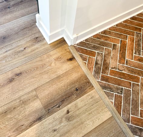 This is a great example of a beautiful transition from wood flooring to a brick tile in herringbone pattern. This would be perfect as an entryway flooring that leads into the rest of the home. 


New Construction | Home Trends 2024 | Home Design | Minnesota Home Trends Brick To Wood Floor Transition, Wood Floor Transition, Floor Transition, Entryway Flooring, Brick Tile, Minnesota Home, Exp Realty, Construction Home, Brick Tiles