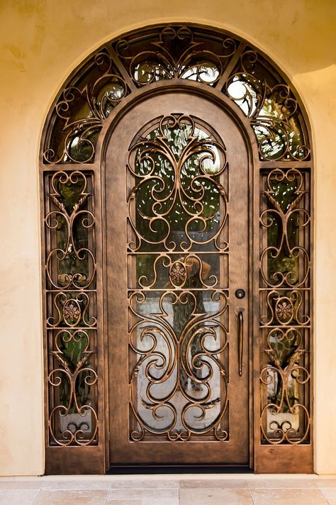 The front door is more than just the barrier that separates the inside of your home and the exterior. It's the portal to your home and a statement so there Porte In Ferro, Open Trap, Gorgeous Doors, Wooden Front Doors, Cool Doors, Iron Door, Front Door Design, Glass Front Door, Iron Work