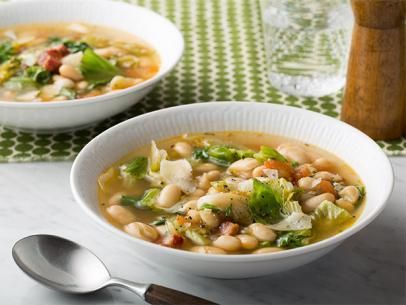 White Bean and Escarole Soup White Bean And Escarole Soup, White Bean And Escarole, Bean And Escarole Soup, Pancetta Soup, Escarole Soup, Tuscan Bean Soup, Parmesan Salad, Bean Soup Recipes, Giada De Laurentiis