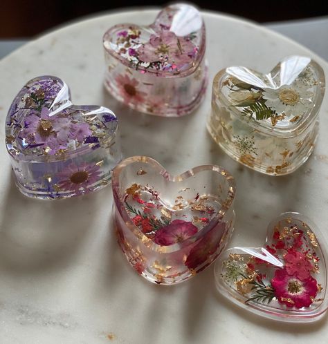 Colorful fresh pressed flowers encased in a crystal clear resin shaped box of your choice, with lid and embellished with sparkling foil.  Perfect for jewelry, keepsakes, desk and craft room organizing.  Inspired by my grandmothers painted porcelain dishes she had throughout her house for her jewelry's safe keeping while cooking and cleaning. As with most epoxy mediums, small imperfections and bubbles are an expected and often unavoidable part of the process and give each small batch poured item Craft Room Organizing, Art Boxes, Porcelain Dishes, Resin Box, Preschool Craft, Resin Crafts Tutorial, Bridal Party Favors, Heart Shape Box, Resin Design