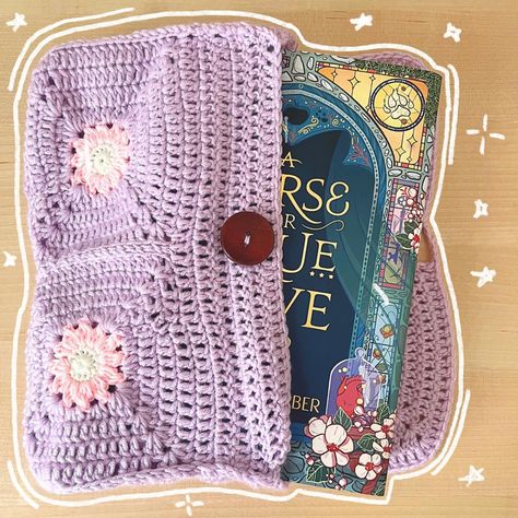 ₊ ˚ . Flower book sleeve ₊ ˚ . This book sleeve was made for an order ! I’m so happy with the way it turned out💓 it took so long but it was so worth it!! The customer requested purple as the main colour, I pretty much freehanded it except for the granny squares. *If anyone’s interested in purchasing anything dm me! Granny square Pattern: all about Ami on yt 🏷️: #crochet #cute #handmade fiber art handmade granny square purple small business book sleeve coquette flowers crochet Doha Qatar... Coquette Flowers, All About Ami, Crochet Purple, Purple Books, Business Book, Granny Square Pattern, Crochet Cute, Flowers Crochet, Doha Qatar