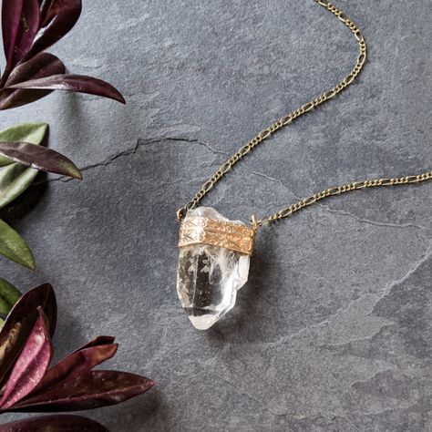 This Artisan Made Pendant Necklace Is The Perfect Boho Statement! It Features A Patterned Brass Band That Has Been Specifically Designed And Cast To Fit Its Large, Natural Quartz Crystal Point For A One-Of-A-Kind Design Made Right Here In The Usa. Whether Your Bohemian Style Is More Ethereal Fairy, Earth Mother, Or Magical Witch, These Quartz Pendants Are Exactly What You Need To Complete Your Outfit. Nwt. Specifications Natural Quartz Brass Setting Aged Bronze Chain Artisan Made In The Usa Meas Awe Jewelry, Raven Jewelry, Ethereal Fairy, Silversmithing Jewelry, Crystal Point Necklace, Earth Mother, Aged Bronze, Brass Band, Jewelry Aesthetic