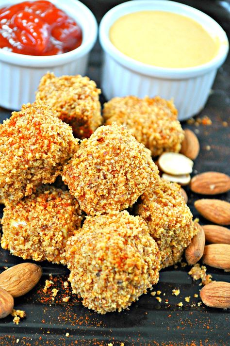 Vegan tofu nuggets crusted with roasted almonds, cayenne and paprika. The perfect vegan and gluten free savory snack! Delicious with all kinds of dips. Almond Tofu, Crusted Tofu, Best Vegan Snacks, Rabbit And Wolves, Tofu Nuggets, Vegan Apps, Gluten Free Holiday Recipes, Spicy Almonds, Vegan Grilling