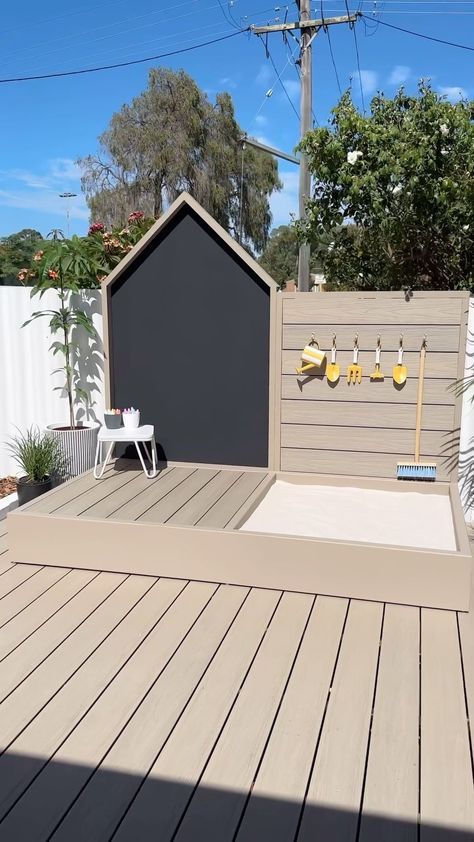 Creating a DIY chalkboard playspace complete with a sandpit and kid’s garden tool wall, everything sourced from my local @bunnings… | Instagram Sliding Dog Gate, Kids Garden Play Area, Play Area Garden, How To Paint Concrete, Kids Garden Play, Turf Backyard, Kid Friendly Backyard, Outdoor Chalkboard, Tool Wall