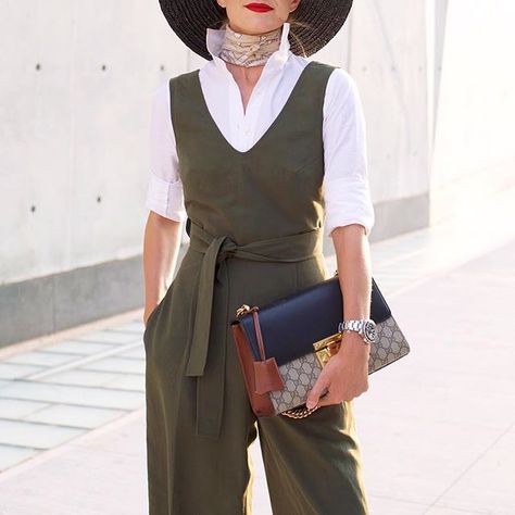 layers. olive jumpsuit with crisp white shirt. Shirt Under Jumpsuit, Olive Jumpsuit, Blair Eadie, Solid And Striped, Fashion Sites, Jumpsuit Outfit, Concrete Jungle, New Classic, White Outfits