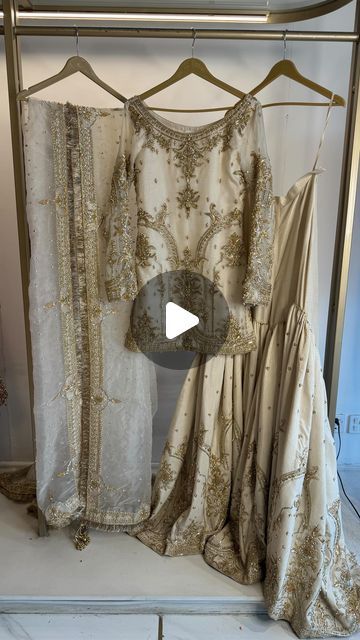 MAHA WAJAHAT KHAN on Instagram: ""𝗭𝗼𝗵𝗿𝗮" – Embodied Elegance in Ivory and Gold. An ethereal ensemble featuring an organza shirt and dupatta paired with raw silk farshi gharara. Exquisitely hand-embellished to radiate timeless beauty." • Now available in store! 📍Location: Idrees market, street#11A, F-10/2, islamabad Contact on +923072827111 • DM to get more information on these articles! #mahawajahatkhan #mahawajahatofficial #mahawajahatphotography #mahasphotography" Farshi Gharara, Organza Shirt, Market Street, Jewelry Outfit, Raw Silk, Timeless Beauty, In Store, Silk, Gold