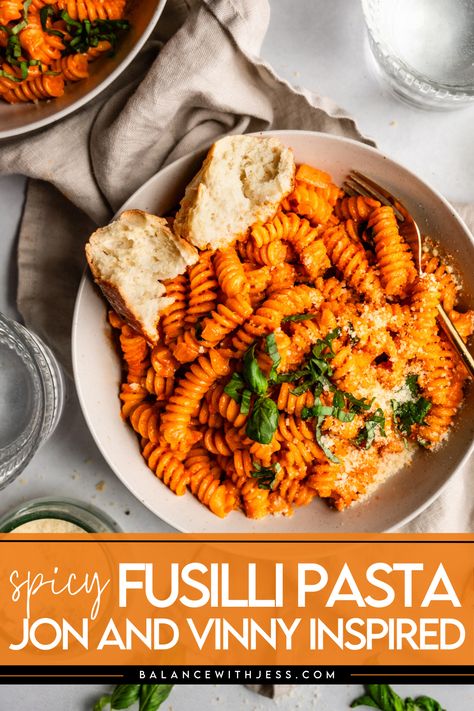 Inspired by Jon and Vinny, this Fusilli alla Vodka is one of the best easy Italian recipes! Creamy, sweet and delicious, your spicy Fusilli pasta with tomato and cream is ready to go in under 30 minutes. Top with basil, parmesan and your favorite protein, and enjoy. John And Vinny Spicy Fusilli, Fusilli Bucati Pasta Recipes, Fusilli Alla Vodka, Fusilli Corti Bucati Recipes, Fusilloni-pasta Recipe, Fusilli Col Buco Pasta Recipes, Spicy Fusilli Pasta, Thanksgiving Pasta Recipes, Jon And Vinny