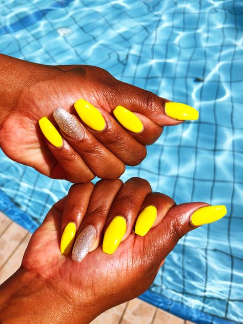 Neon yellow nails with silver glitter on the ring finger #summernails #poolside #holidaynails #brightnails #nailscoffin Neon Yellow And Purple Nails, Yellow Nails With Glitter, Nails With Silver Glitter, Nails With Silver, Neon Yellow Nails, Nails With Glitter, Bright Nails, Yellow And Purple, Beef Recipes Easy