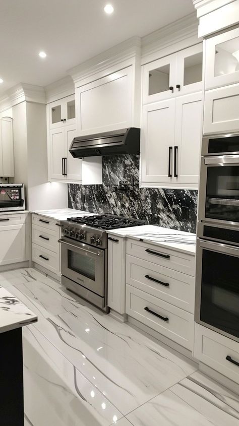 Modern white kitchen with black marble backsplash, stainless steel appliances, and white cabinetry Black Marble Backsplash, Modern White Kitchen Design, Modern White Kitchen, Flatpack Kitchen, Kitchens Cabinets, Cabinet Options, Condo Kitchen, High End Kitchens, Kitchen Organisation