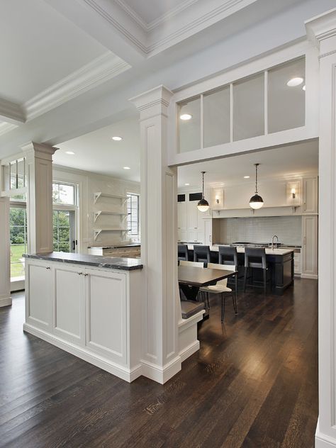 SallyL: Oxford Development - Elegant, traditional kitchen design with transom windows and pass ... I like how the backside of the pass is used as bench seating Half Wall With Columns, Kitchen Island With Columns, Column Design Ideas, Half Wall Kitchen, Kitchen Pass Through, Kitchen Pass, Banquette Design, Traditional Kitchen Design, Column Design