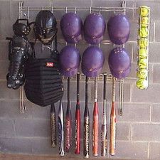 Baseball Dugout Organizer Rack keeps your dugouts organized with this durable, steel rack that is easily attached to cement, brick, or wood dugout walls. Holds up to 8 batting helmets, 10 bats and includes a ball chute for 10 baseballs. Dugout Organization, Softball Dugout, Baseball Storage, Organize Clutter, Baseball Dugout, Softball Gear, Baseball Ideas, Sports Storage, Team Organization