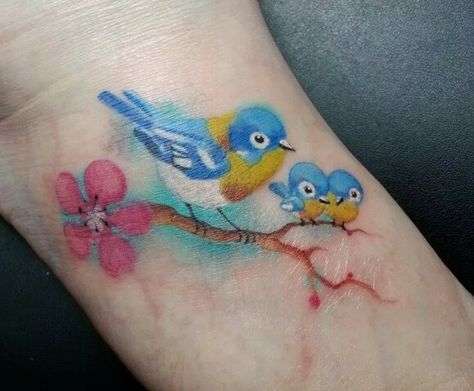 My Mother's Day tattoo. Momma bird with her two babies, to represent my two boys. ❤️  Mom tattoo  Single mother tat Bird Mom Tattoo, Plumeria Tatoos, Mom And Daughter Tattoos Birds, Mama Bird Tattoo, Three Birds And Flowers Tattoo, Baby Bird Tattoo, Blue Bird Memorial Tattoo, Momma Bird And Baby Bird Tattoo, Mom And Baby Bird Tattoo