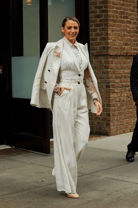 Blake Lively wears the Corsage Tailored Pant, matching vest and Corsage Blazer from our Resort 19 Ready-to-Wear Collection while out and about in New York. Blake Lively Blazer Outfit, White Pinstripe Suit Women, White Blazer Suit Women, Stripped Suit Women, White Pinstripe Blazer Outfit, Stripe Suit Woman, Long Line Blazer Outfit, Pin Stripe Outfit, Pin Stripe Suit Women