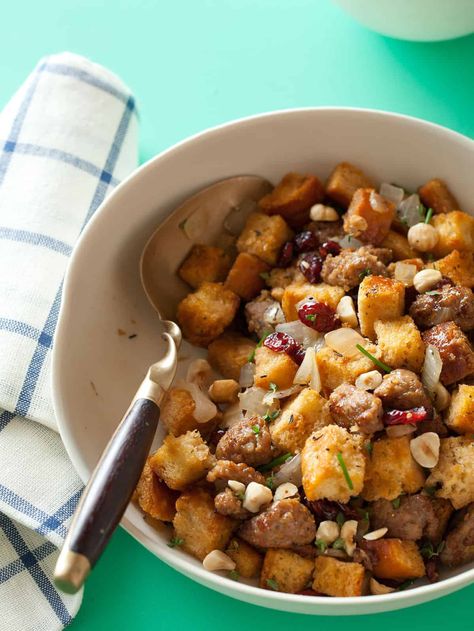 Sausage and Sage Stuffing with Dried Cranberries and Toasted Hazelnuts Sausage Sage Stuffing, Holiday Stuffing, Sage Stuffing, Hazelnut Recipes, Spoon Fork Bacon, Sage Sausage, Italian Sausage Recipes, Sweet Italian Sausage, Stuffing Recipes