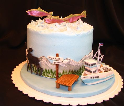 Alaska Native - This was for an Alaskan native.  It has the typical wildlife of Copper River salmon, moose, grizzly and polar bears, a fishing boat that resembles one the birthday girl worked on as a teenager, and the Alaskan mountain range all around.  All the decorations are gumpaste or fondant, and the boat is rice krispy treats covered with gumpaste.  I painted the fondant mountains with grey food color, painted on the pine trees, then used royal icing to add snow.  The boat is named ... Alaska Party, Alaska Cake, Cordova Alaska, Moose Cake, Copper River Salmon, Boat Cake, Alaska Wedding, Rhubarb Cake, Baking Business