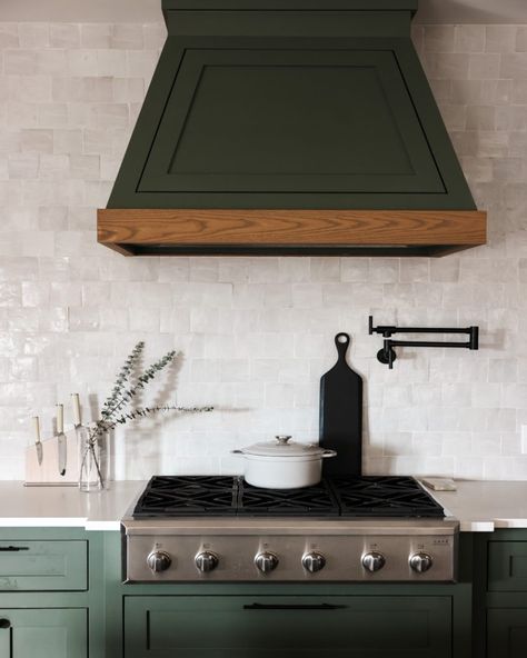 Green Kitchen Hood, Green And Taupe Kitchen, Kitchen Hood Ideas, Hanging Sconces, Taupe Kitchen, Kitchen Vent Hood, Two Tone Kitchen Cabinets, Oven Hood, Kitchen Vent