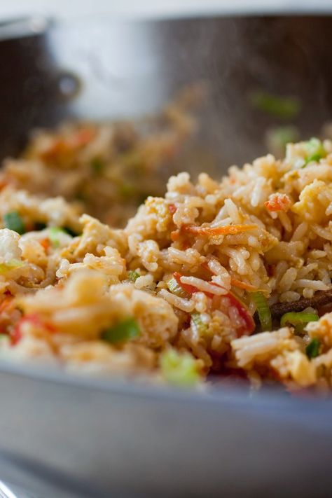 NYT Cooking: This dish is loosely based on Thailand’s ubiquitous fried rice dish, kao pad. Usually some kind of animal protein accompanies the rice — squid, crabmeat, ham, chicken, whatever the cook has on hand. My version relies instead on tofu and vegetables; the most important ingredients are the rice itself, the garlic and the fish sauce. Have all of your ingredients prepared and%2... Combination Fried Rice, Thai Fried Rice, Rice Dish, Nyt Cooking, Fried Rice Recipe, Rice Recipe, Rice Dishes, Thai Recipes, Rice Recipes