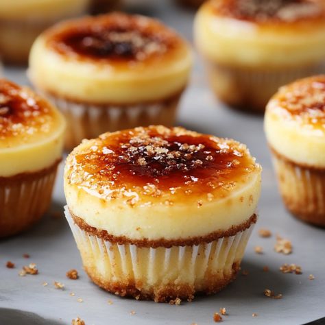 Imagine indulging in a dessert that marries the creamy richness of cheesecake with the elegant simplicity of crème brûlée. These Easy Crème Brûlée Cheesecake Cupcakes are exactly that—a delightful fusion Creme Brulee Cheesecake Cupcakes, Cream Brulee Cheesecake, Creme Brulee Cheesecake Bars, Brulee Cheesecake, Carrot Cake Cheesecake Recipe, Creme Brulee Cheesecake, Peach Pound Cakes, Cream Cheese Cupcakes, Cream Brulee