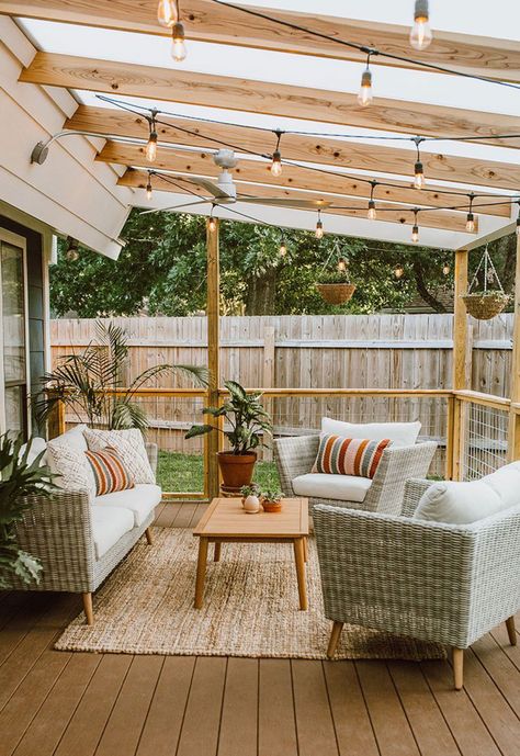 An outdoor patio roof is like a big umbrella for your patio. It covers the area to keep you safe from the sun, rain, and wind while you're outside. It can be made of wood, metal, or fabric, and it's either attached to the house or stands on its own with poles. Some patio roofs are solid, while others have spaces to let light and air through. With a patio roof, you can enjoy your outdoor space without worrying about bad weather. #roof #roofideas #outdoorroof #patio Patio With Roof, Small Covered Patio Ideas, Patio Covers Attached To House, Deck With Roof, Outdoor Patio Roof, Patio Roof Ideas, Patio Roofs, Small Covered Patio, Big Umbrella