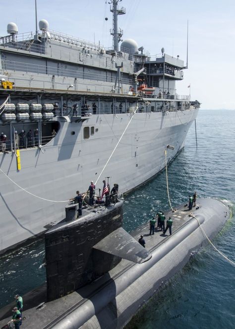 The submarine tender USS Emory S. Land (AS 39) conducts a tended mooring with the Los Angeles-class attack submarine USS Key West (SSN 722) alongside while anchored outside of Phuket, Thailand as part of Guardian Sea 2015, an annual exercise with the Royal Thai Navy. US Navy photo. Us Navy Submarines, Utility Boat, Navy Submarine, Navy Day, Row Boats, Us Navy Ships, Cabin Cruiser, Naval Force, Phuket Thailand