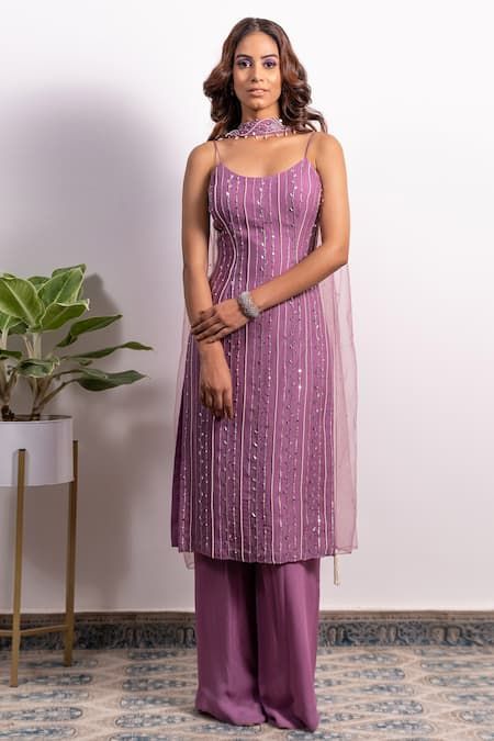 Buy Purple Georgette Embroidery Pearl Round Strappy Kurta Pant Set For Women by Silky Bindra Online at Aza Fashions. Net Straight Kurti Designs, Kurti Ideas For Wedding, Sleeveless Kurti Pants Design, Suit Piece Design Women, One Piece Indian Dress Outfit, New Kurta Set Design Women, Embroidery Net Fabric Dresses, Indian Chudidar Designs, Sleeveless Straight Kurti Designs