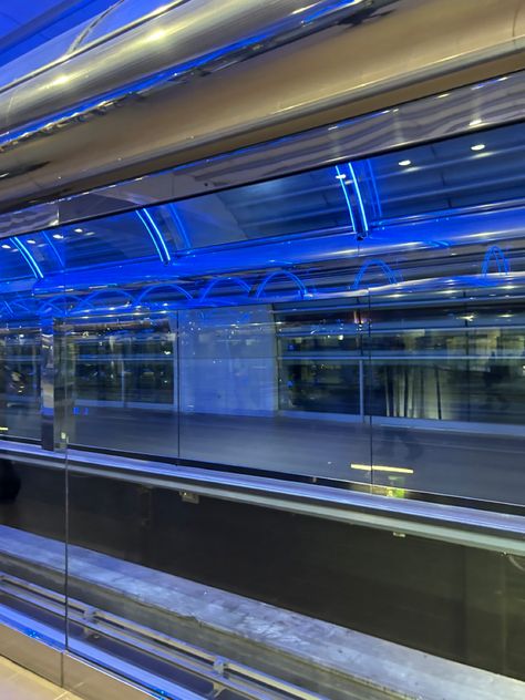 train tram station orlando international airport florida blue light aesthetic modern ride disney disney world land Orlando Florida Airport, Blue Light Aesthetic, Tram Station, Orlando Airport, Orlando International Airport, Airport Aesthetic, Disney 2024, Light Aesthetic, Vacation Vibes