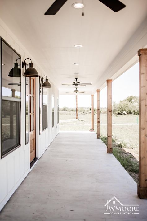 Pole Barn With Porch, White House Black Trim Cedar Accents, White Ranch House, House Front Porch, Backyard Fireplace, Farmhouse Remodel, Casa Exterior, Barn Style House, Custom Built Homes