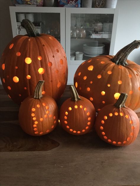 Polka dot pumpkin made with drill bits! So easy and so pretty! #pumpkin #halloween #pumpkincarving #diy Dotted Pumpkin Carving, Drill Bit Pumpkin Carving, Pumpkin Carving With Drill, Pumpkin Drilling, Spider Pumpkin, Polka Dot Pumpkin, Easy Pumpkin Carving, Clay Pot People, Pot People