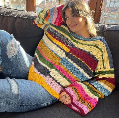 * Crochet Colorful Striped Patchwork Sweater * Processing time 1-2 weeks  * The model is wearing a medium 60 kg, 1.65 length * %100 Cotton yarns * Completely Hand-knitted  * It is recommended to wash at 30 degrees or just hand wash with cold water. * After we ship your product, we give you a tag number. This number is updated within the first 24 hours. Then you can follow the updates by clicking on them. Welcome to Bhava's 🌻 Here you will find tops, skirts, shirts, dresses, cardigans, and many Colorful Crochet Sweater Pattern, Colorfull Sweater, Crochet Patchwork Sweater, Striped Crochet Sweater, Crochet Sweatshirt, Gender Neutral Fashion, Crochet Colorful, Sweater Handmade, Big Sleeves