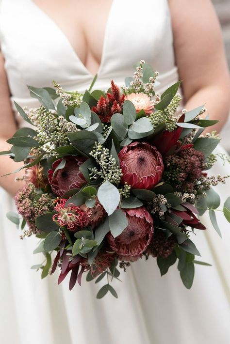 Audley Dance Hall wedding flowers. Wildflower protea bridal bouquet, wildflower native arbour, low table arrangements of natives and wildflowers. Bridal Bouquet Australian Natives, Australian Native Wedding Florals, Bridal Bouquet Protea, Audley Dance Hall Wedding, Wedding Native Flowers, Australian Native Wedding Arbour, Australian Natives Wedding, Bridal Bouquet Wildflower, Protea Bouquet Wedding