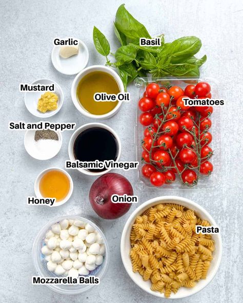 This Caprese Pasta Salad is made with fresh tomatoes, pasta, mozzarella cheese balls, basil leaves, and coated with a delicious balsamic vinegarette dressing. Served as an appetizer or side dish, easy to make and very flavorful. #pastasalad #capresesalad #caprese #easysalad #vegetarianpastasalad Pasta With Mozzarella Cheese Balls, Easy Caprese Pasta Salad, Pasta Salad With Mozzarella Balls, Fresh Tomatoes Pasta, Caprese Salad Pasta, Balsamic Pasta Salad, Mozzarella Cheese Balls, Salad Dressing Recipes Vinaigrette, Side Dish Easy