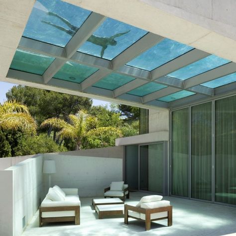 The glass-bottomed pool projects out across a semi-enclosed terrace that has a rippled light effect from the water above. Villas In Italy, Miami Houses, Concrete House, Interior Renovation, Rooftop Pool, Design Hotel, Swimming Pool Designs, Roof Top, Apartment Garden