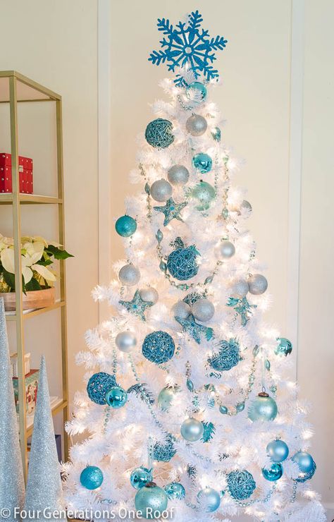 Blue + white Christmas tree - Four Generations Under One Roof - 2014.  Lovely~ Decoracion Navidad Diy, White Xmas Tree, Blue Christmas Tree Decorations, White Christmas Tree Decorations, Teal Christmas, Turquoise Christmas, Blue Christmas Tree, Christmas Surprise, Gold Christmas Decorations