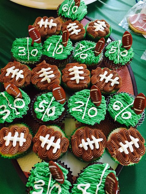 Football Theme Party For Men, 1st Year Down Cupcakes, Nfl Cupcakes Decorating Ideas, Football Birthday Party Cupcakes, First Year Down Football Birthday Cupcakes, Fondant Football Cupcake Toppers, Football Themed Smash Cake Photos, Football Themed Cupcake Ideas, Diy Football Cupcakes