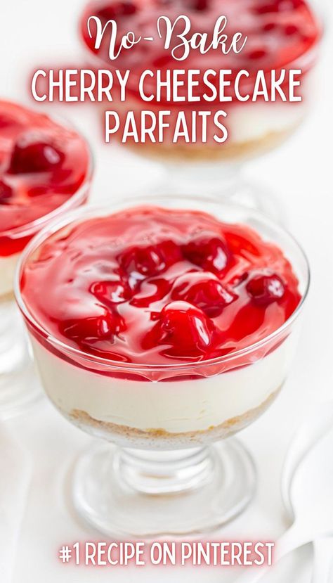 Close-up of cheesecake parfait with a graham cracker crust and cherry pie filling topping. Cheesecake In A Cup No Bake, Cheesecake Parfait Cups, Cherry Cheesecake Parfait, Desert Shooters, Dinner Deserts, Cookout Dessert, Cherry Parfait, Cheesecake Cups Recipe, Cheesecake Parfait