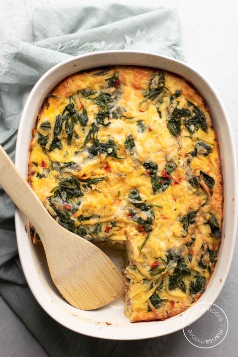 Make this easy hashbrown breakfast casserole with spinach, red bell peppers, and onions for a veggie-packed start to the day! It's a perfect make-ahead breakfast for any day or Christmas or New Year's Day morning! Vegetable Breakfast Casserole With Hashbrowns, Egg And Hashbrown Casserole No Meat, Christmas Egg Hashbrown Casserole, Vegetarian Christmas Breakfast Casserole, Veggie Hashbrown Casserole, Meatless Breakfast Casserole With Hashbrowns, Make Ahead Breakfast Vegetarian, Egg Hashbrown Casserole Easy, Vegetarian Hashbrown Casserole