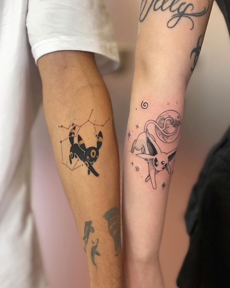 Umbreon X Espeon 🌑🌸✨ . . . . 💌 Info & Booking in DM . #tattoo #tattooideas #umbreon #espeon #empoli #art #danafirenze #inked #blkttt #pokemonart #pokemontattoo #pokémon #umbreonxespeon Pokemon Forearm Tattoo, Umbreon And Espeon Matching Tattoos, Umbreon Espeon Tattoo, Umbreon Tattoo Ideas, Umbreon And Espeon Tattoo, Eeveelution Tattoo, Small Pokemon Tattoo, Umbreon X Espeon, Espeon Tattoo