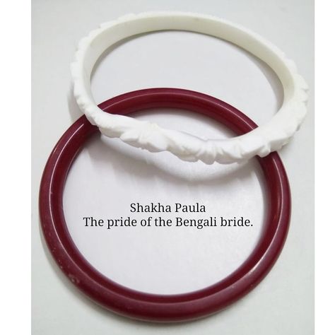 The Shakha Paula are worn by Bengali married women. The white bangle, Shakha, is made of conch shell, and has carvings on it. The red one, Paula,  is made of coral and is smooth. In the olden days, they also wore Loha, an iron bangle. The Shakha Paula and sindoor are the mark of a married woman. Thank you, @amitins for this beautiful pic.  #bengali #bengaliculture #bengaliwedding Bengali Wedding Aesthetic, Shakha Pola Bangles, Bengali Bangles, Bengali Aesthetic, Bengali Jewellery, Bengali Culture, Wedding Captions, Cute Beach Pictures, Bridal Songs