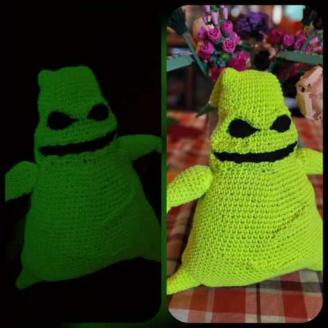 I had to make glow in the dark Oogie Boogie to go along with my Zero! I attempted to scrunch up the fabric to make ridges around the eyes, mouth, and on the body. I think it makes it look a lot better than sewing in extra crocheted strips. I finished him in time to take the kids to Disneyland where we attended the Halloween Oogie Boogie Bash event but of course they forgot to grab him when we were packing.. but he glows really well and I absolutely love him! Glow In The Dark Yarn Ideas, Glow In The Dark Yarn Crochet, Crochet Glow In The Dark, Glow In The Dark Yarn Crochet Patterns, Oogie Boogie Crochet Pattern Free, Oogie Boogie Crochet Pattern, Crochet Oogie Boogie, Halloween Oogie Boogie, Glow In The Dark Crochet