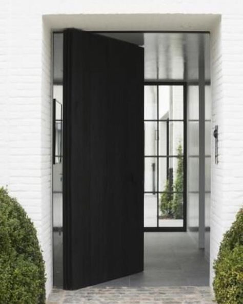 Pivot door entry, white painted brick Black Door, Pivot Doors, Casa Exterior, Open Door, White Brick, Black Doors, Beautiful Doors, Exterior Brick, Style At Home