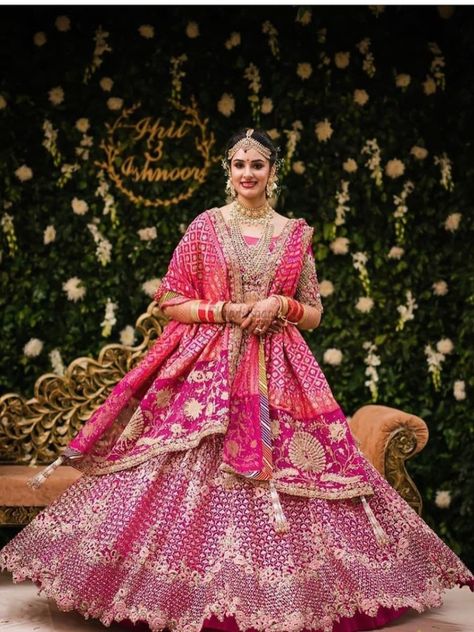 Check out Rimple and Harpreet's bridal Lehenga that we are totally drooling over. Check his bridal Lehenga & Saree pieces and Different ways to drape them and also Groom Wear in the link attached below.   #indianweddings #shaadisaga #intimatewedding #indiandesigners #weddingdesigners #weddingoutfits #bridallehenga #bridalsaree   #lastestdesignlehenga #indianweddingtrends #lockdownweddings #pastellehenga #uniquelehenga #embellishedlehenga Hot Pink Bridal Lehenga Wedding, Magenta Pink Bridal Lehenga, Hot Pink Bridal Lehenga, Bridal Lehenga Indian, Bridal Lehenga Wedding, Pink Bridal Lehenga, Bridal Lehenga Designs, Latest Bridal Lehenga, Indian Bridal Lehenga