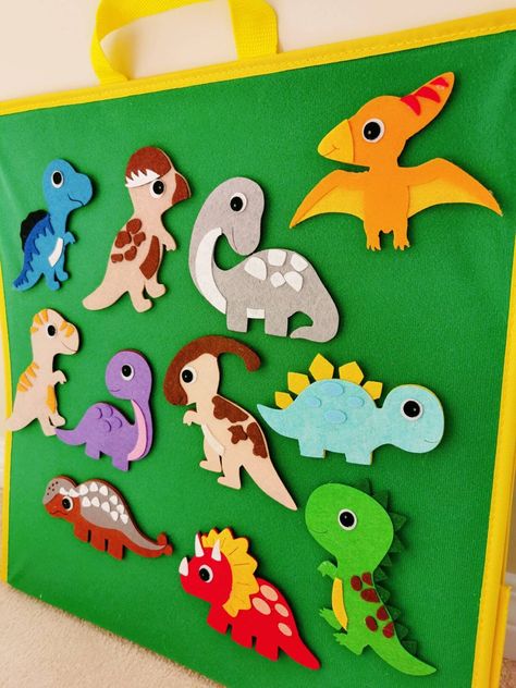 "Dinosaurs Felt set It is perfect for small fingers to play along while the stories of Dinosaurs are being read/told, or alone to develop imaginative play. Can be used on any flannel/felt board. Option 1 (small set) includes 5 Dinosaurs 1 volcano  1 egg 1 tree 2 grass Option 2 (big set) includes 11 Dinosaurs 1 volcano  1 egg 1 tree 2 grass If you would like your Felt Story CUSTOMIZED to include specific colors or sizes, click on \"Request a Custom Order\" and let me know what you are thinking. Felt Dinosaur, Felt Dinosaur Pattern Free, Diy Felt Dinosaur Pattern Free, Dinosaur Felt Story, Dinosaur Quiet Book Ideas, Felt Triceratops, Dinosaur Play, Dinosaur Toys For Kids, Felt Board Stories