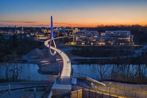 Dublin, Ohio Builds A Pedestrian Bridge Between Old And New #forsale #chicago #realestate #homebuying #homeselling Brick Sidewalk, Cable Stayed Bridge, Dublin Ohio, Visit Dublin, European Village, Outdoor Park, Pedestrian Bridge, Suspension Bridge, Historical Architecture