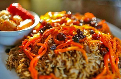 Qabuli- Afghan brown rice dish with carrots and raisins! #Afghanfood Yummmmmmy Rice With Raisins, Afghan Rice, Brown Rice Dishes, Recipe With Carrots, Pakistani Rice, Afghanistan Food, Afghan Recipes, Pulao Rice, North African Food